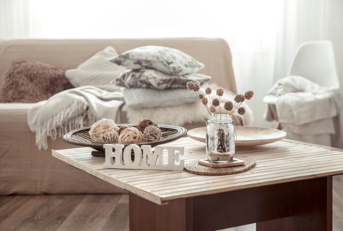 Cozy bright living room with sofa and pillows.